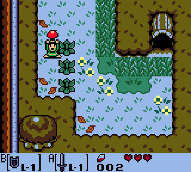 Still frame: Link on a forest screen, holding a red mushroom overhead.